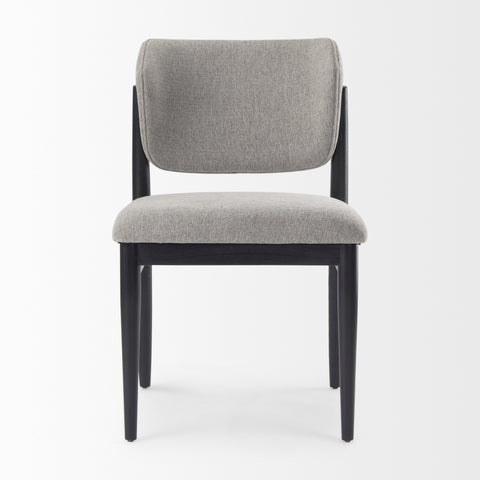 Gray upholstered chair with black legs 
