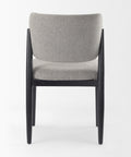 Chair with gray cushioned seat and backrest on a white background