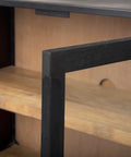 Close-up of a wooden shelf with metal bracket
