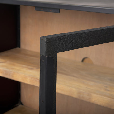 Close-up of a wooden shelf with metal bracket