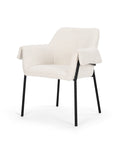 White upholstered chair with black legs on a white background