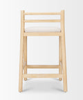 Wooden bar stool with a white cushion on a light gray background