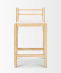 Wooden bar stool with a white cushion on a light gray background