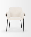 White upholstered chair with black legs on a white background