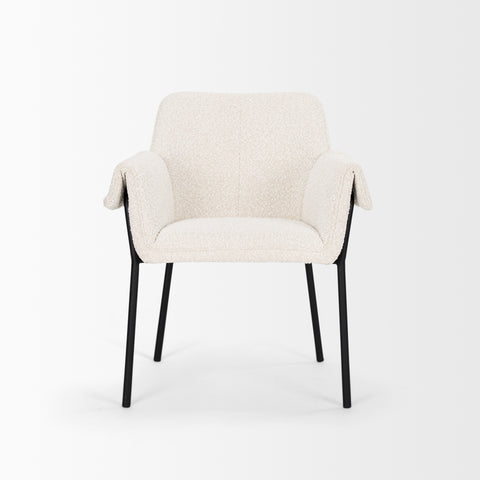 White upholstered chair with black legs on a white background