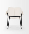 White upholstered chair with black metal frame on a white background