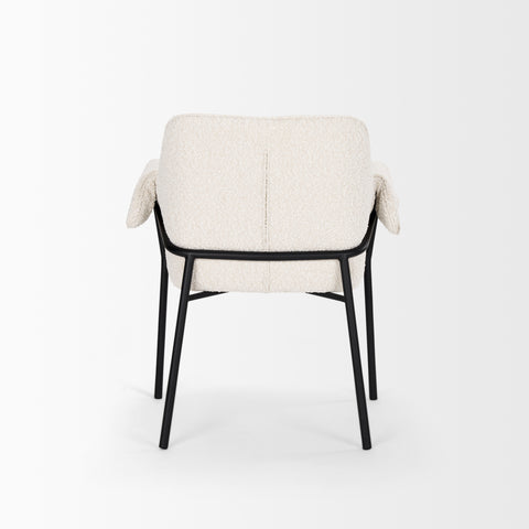 White upholstered chair with black metal frame on a white background