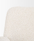 Close-up of a textured white chair backrest on a light gray background
