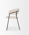 Modern chair with beige seat and backrest on a white background