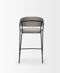 Bar stool with gray cushioned seat and backrest on a white background