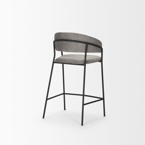 Bar stool with gray cushioned seat and backrest on a white background