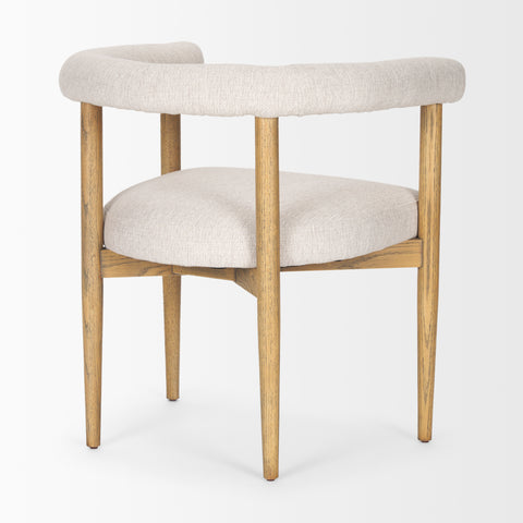 Beige upholstered chair with wooden legs on a white background