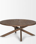 Round wooden table with a unique base design on a white background