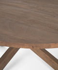 Close-up of a wooden table with a white background
