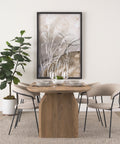 Dining room with wooden table, chairs, and decorative elements.