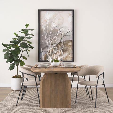 Dining room with wooden table, chairs, and decorative elements.