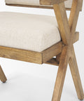 Wooden chair with beige cushion on a white background