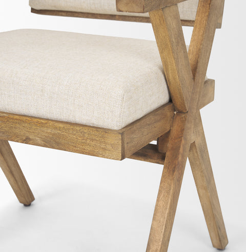 Wooden chair with beige cushion on a white background