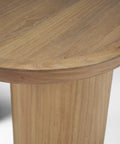 Wooden side table with a round top and cylindrical base on a white background