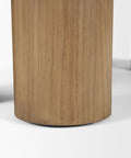 Wooden cylindrical stool on a white background