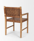 Wooden chair with woven seat and backrest on a white background