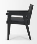 Black chair with woven backrest on a white background