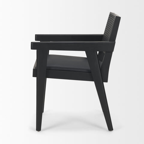 Black chair with woven backrest on a white background