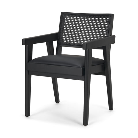 Black armchair with woven backrest on a white background