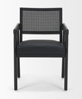 Black chair with woven backrest on a white background