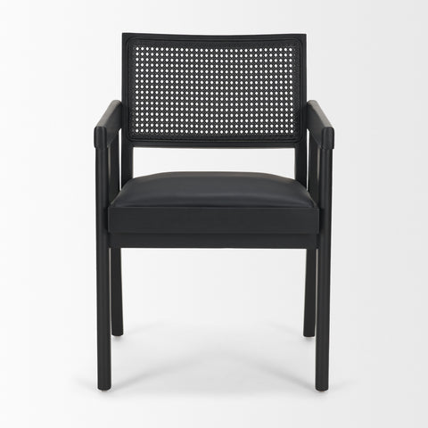 Black chair with woven backrest on a white background