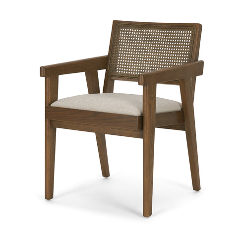 Wooden armchair with wicker backrest and beige cushion on a white background