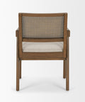 Wooden chair with wicker backrest and cushion on a white background