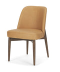 Brown chair with wooden legs on a white background