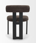 Stool with brown cushioned seat and backrest on a white background