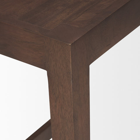 Close-up of a wooden table leg on a white background