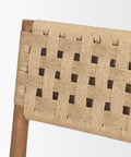 Close-up of a woven chair backrest with wooden frame on a white background