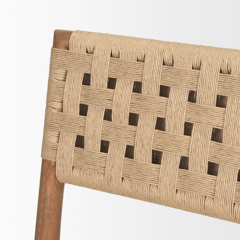 Close-up of a woven chair backrest with wooden frame on a white background