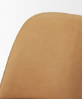 Close-up of a brown chair seat on a white background