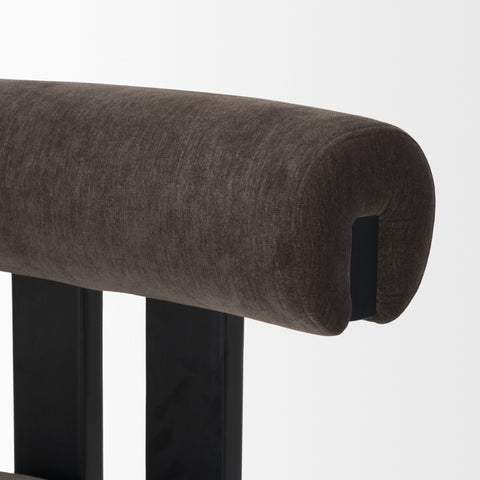 Brown upholstered bar stool with a black metal frame on a white background