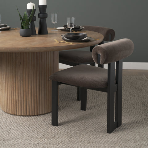 Dining table with chairs in a modern interior setting