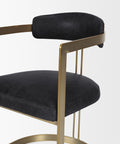 Black chair with gold frame on a white background