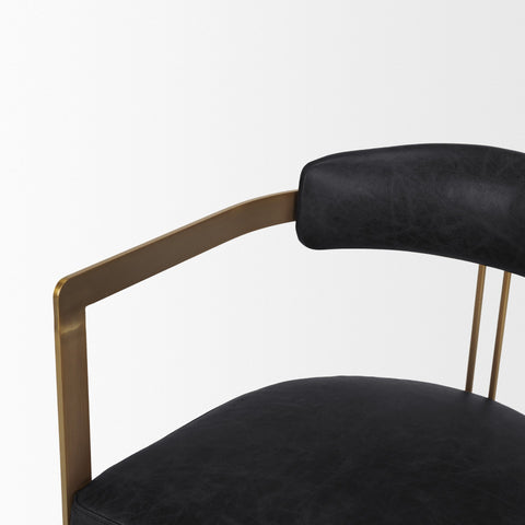 Black leather chair with gold frame on a white background