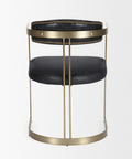 Two-tiered side table with black leather seats and gold metal frame on a white background