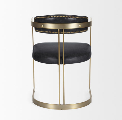 Two-tiered side table with black leather seats and gold metal frame on a white background