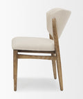 Chair with wooden frame and beige cushion on a white background