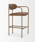 Brown leather bar stool with gold metal frame on a white background