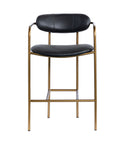 Black leather bar stool with gold frame on a white background