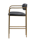 Bar stool with black seat and gold frame on a white background