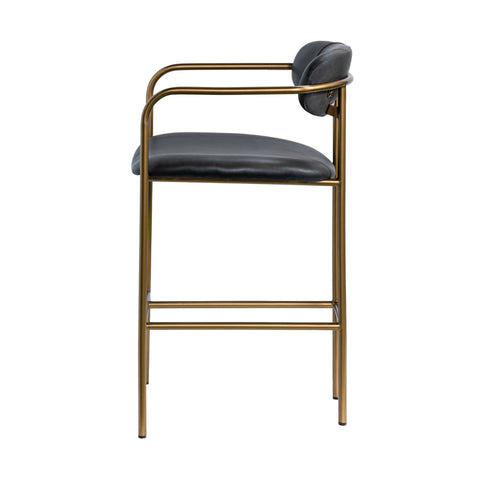 Bar stool with black seat and gold frame on a white background