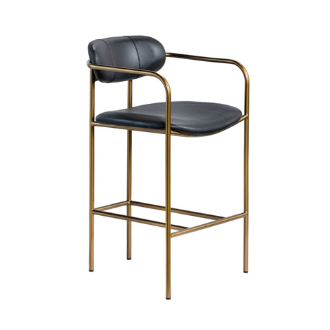 Bar stool with black leather seat and gold metal frame on a white background